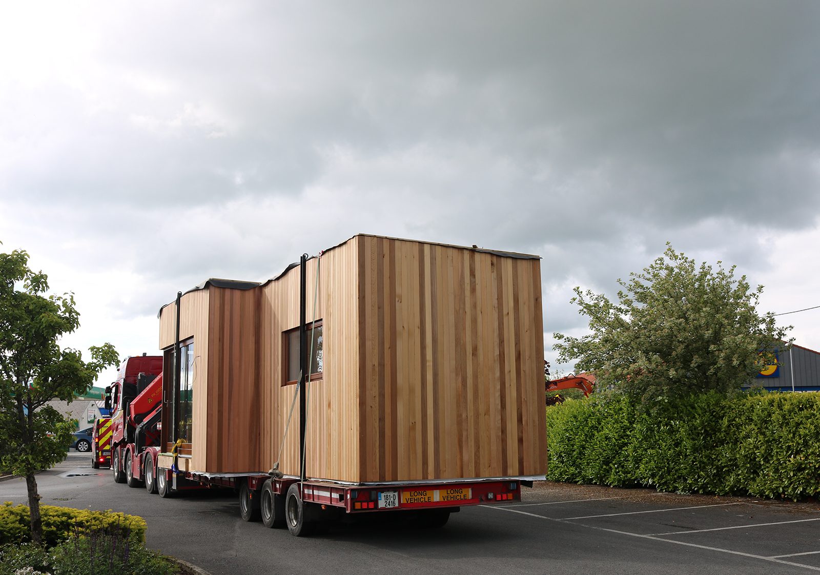 Fully factory-finished dwelling being delivered to site