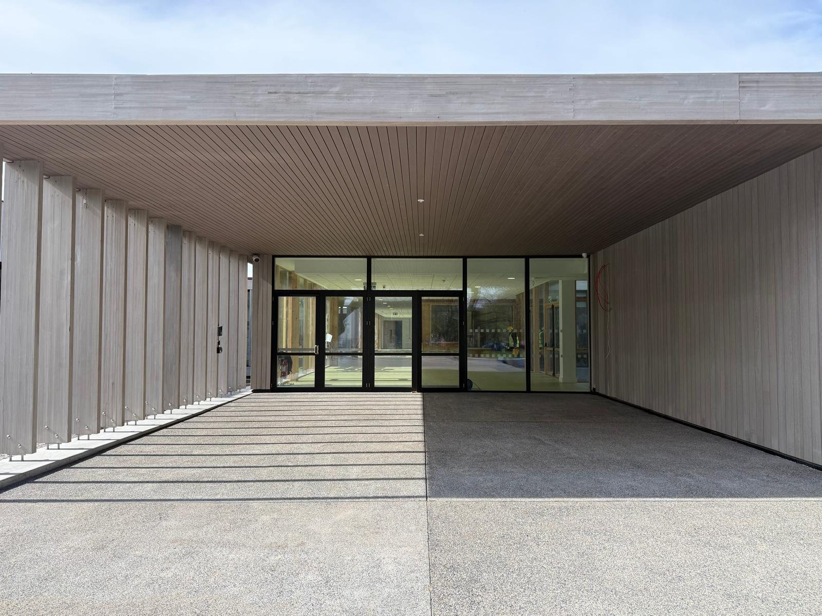 Timber entrance canopy and glazed doors at St Flannan's College, Ennis
